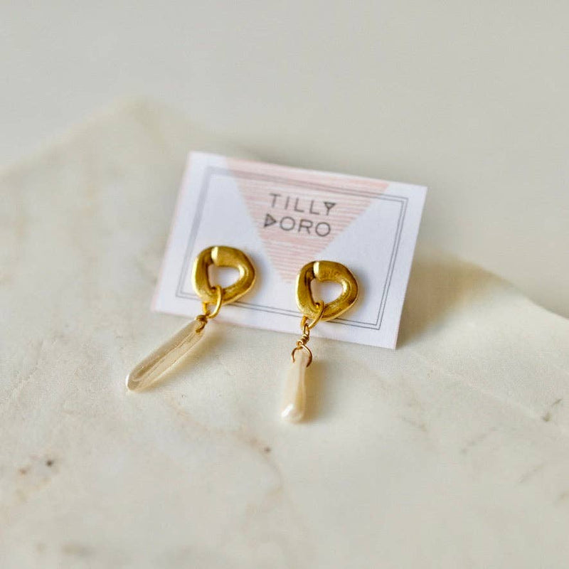 Cycles with pearl drop earrings