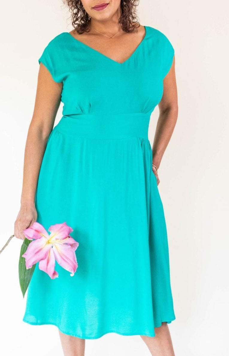 teal dress with pockets